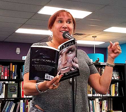 Janet reading from In Depth at Rercycled Reads 20180805