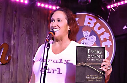 video still from Janet Kuypers reading from the book in at Spoken and Heart at Kick Butt Coffee in Austin, TX 9/15/19