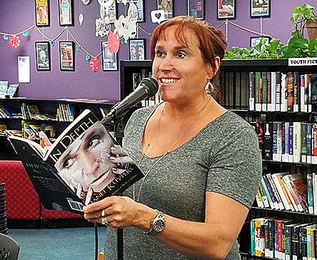Janet reading from In Depth at Rercycled Reads 20180805