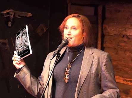 video still form Janet Kuypers reading a poem from this book at Austin’s Fort to Famous at The Buzz Mill 10/15/18