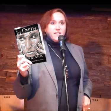 video still form Janet Kuypers reading a poem from this book at Austin’s Fort to Famous at The Buzz Mill 10/15/18