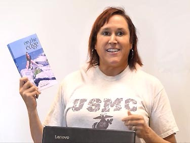 video still from Janet Kuypers at “Poetry Aloud” in Georgetown 5/25/19