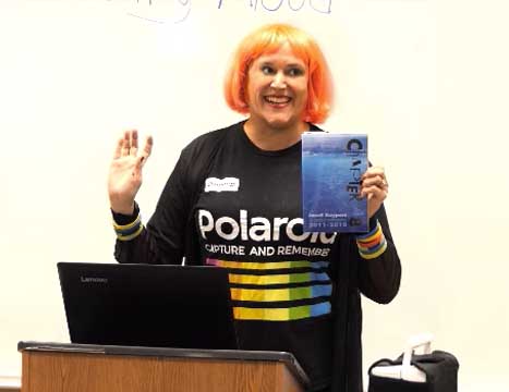 a video still of Janet Kuypers at Poetry Aloud