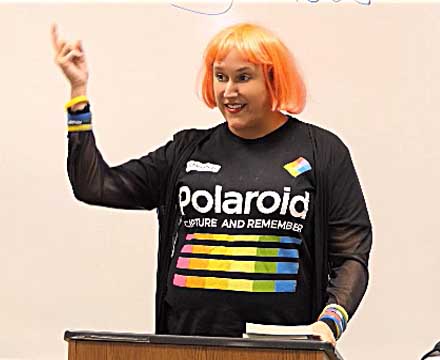 a video still of Janet Kuypers at Poetry Aloud