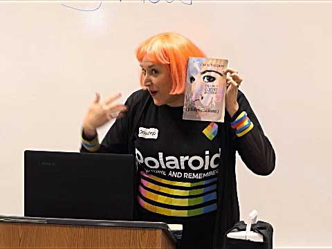 a video still of Janet Kuypers at Poetry Aloud