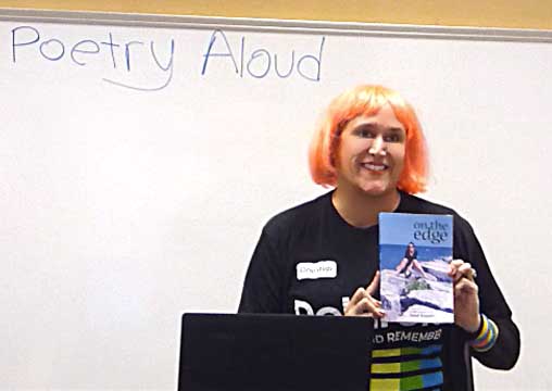 a video still of Janet Kuypers at Poetry Aloud