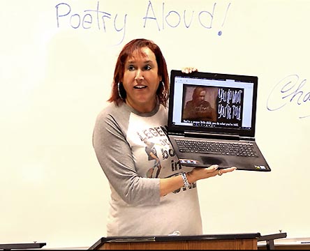 a video still of Janet Kuypers at Poetry Aloud