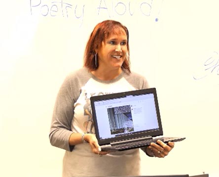 a video still of Janet Kuypers at Poetry Aloud