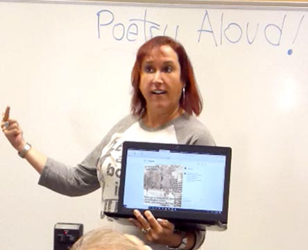 a video still of Janet Kuypers at Poetry Aloud