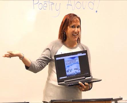 a video still of Janet Kuypers at Poetry Aloud