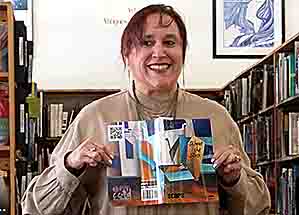 Janet reading from cc&d About the Arts