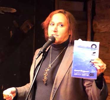 video still form Janet Kuypers reading a poem from this book at Austin’s Fort to Famous at The Buzz Mill 10/15/18