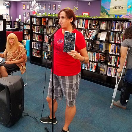 Janet with the book “Let Me See You Stripped” at Recycled Reads 10/21/17