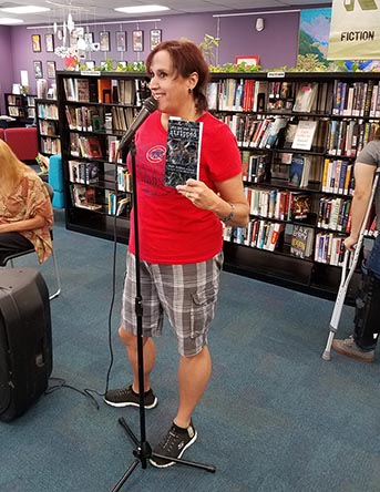Janet with the book “Let Me See You Stripped” at Recycled Reads 10/21/17