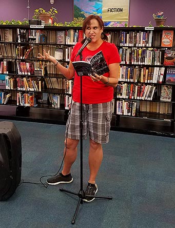 Janet with the book “Let Me See You Stripped” at Recycled Reads 10/21/17