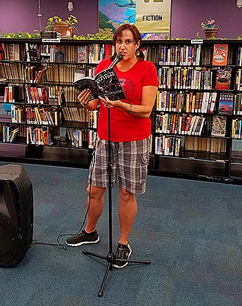 Janet with the book “Let Me See You Stripped” at Recycled Reads 10/21/17