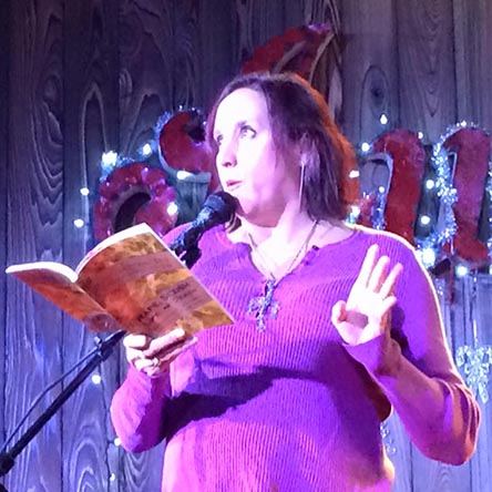 Janet with the book “Rape, Sexism, Life & Death” at Kick Butt Coffee: Spoken and Heard 1/3/16