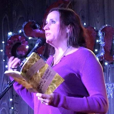 Janet with the book “Rape, Sexism, Life & Death” at Kick Butt Coffee: Spoken and Heard 1/3/16