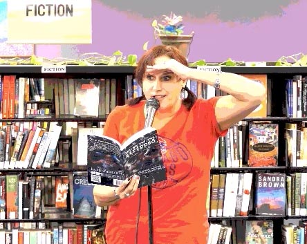 Janet with the book “Let Me See You Stripped” at Recycled Reads 10/21/17