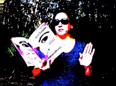 photo of Janet Kuypers from her book “(pheromemes) 2015-2017 poems” live