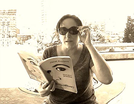 photo of Janet Kuypers from her book “(pheromemes) 2015-2017 poems” live