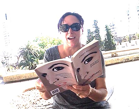 photo of Janet Kuypers from her book “(pheromemes) 2015-2017 poems” live