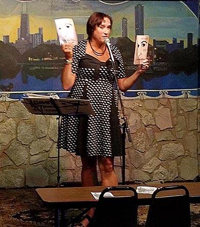 video still of Janet Kuypers reading from her book “(pheromemes) 2015-2017 show poems” live