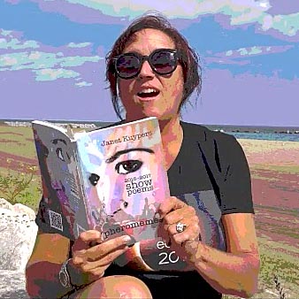 video still of Janet Kuypers reading from her book “(pheromemes) 2015-2017 show poems” live