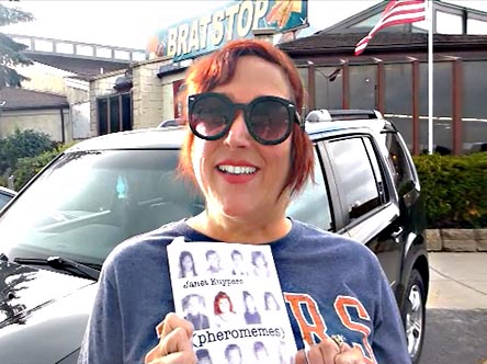 video still from Janet Kuypers reading from the book in from of the Brat Stop restaurant in Kenosha, WI 9/2/19