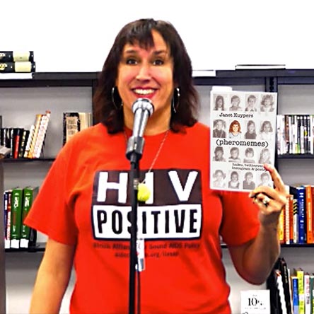video still from Janet Kuypers reading from the book in at her Poetic License open mic in Austin, TX 2/2/20